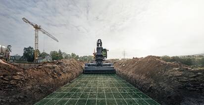 View of an excavator trench with Volvo Active Control gridlines represented to show how it works.
