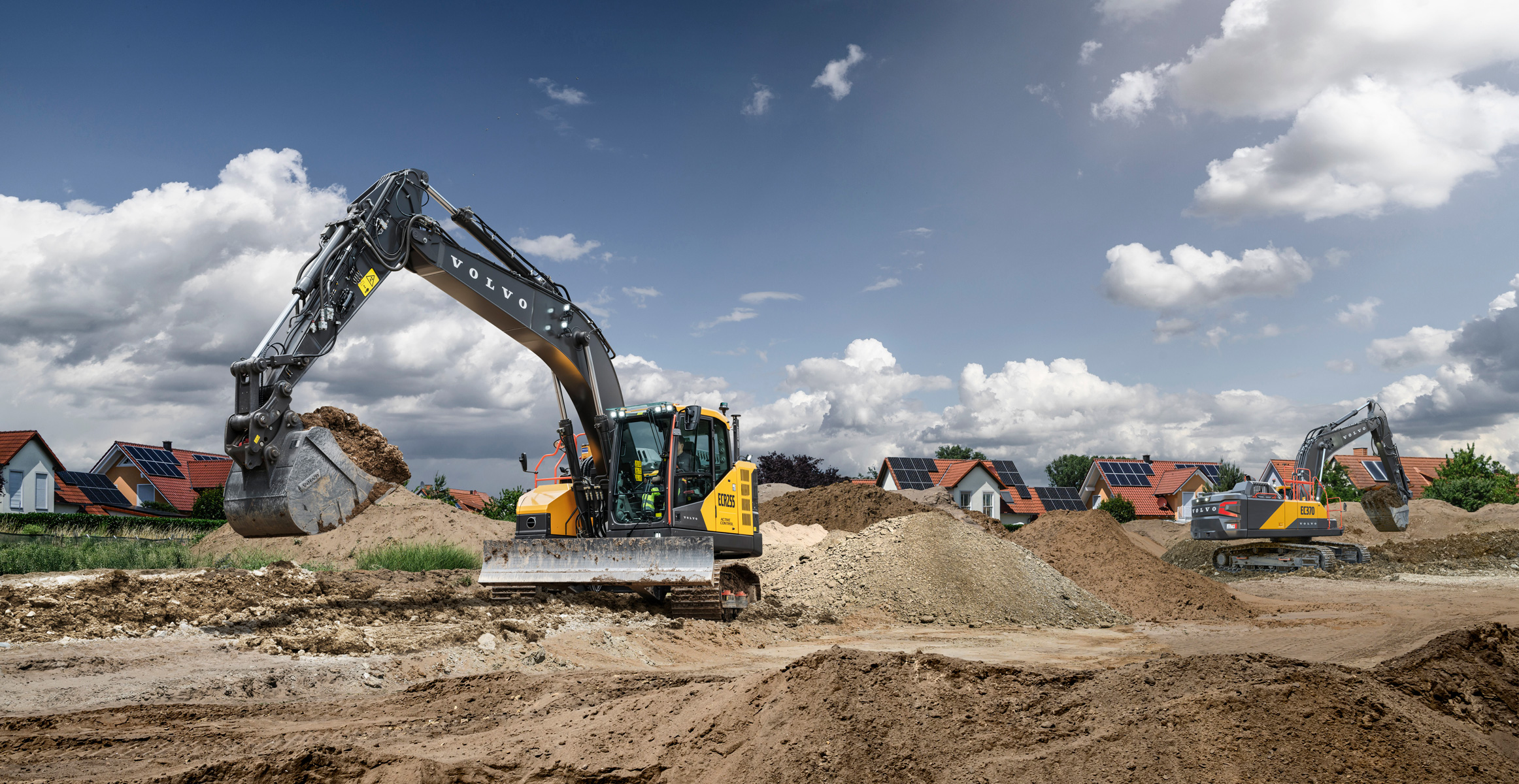 Volvo ECR255 and EC370 Excavators on job site