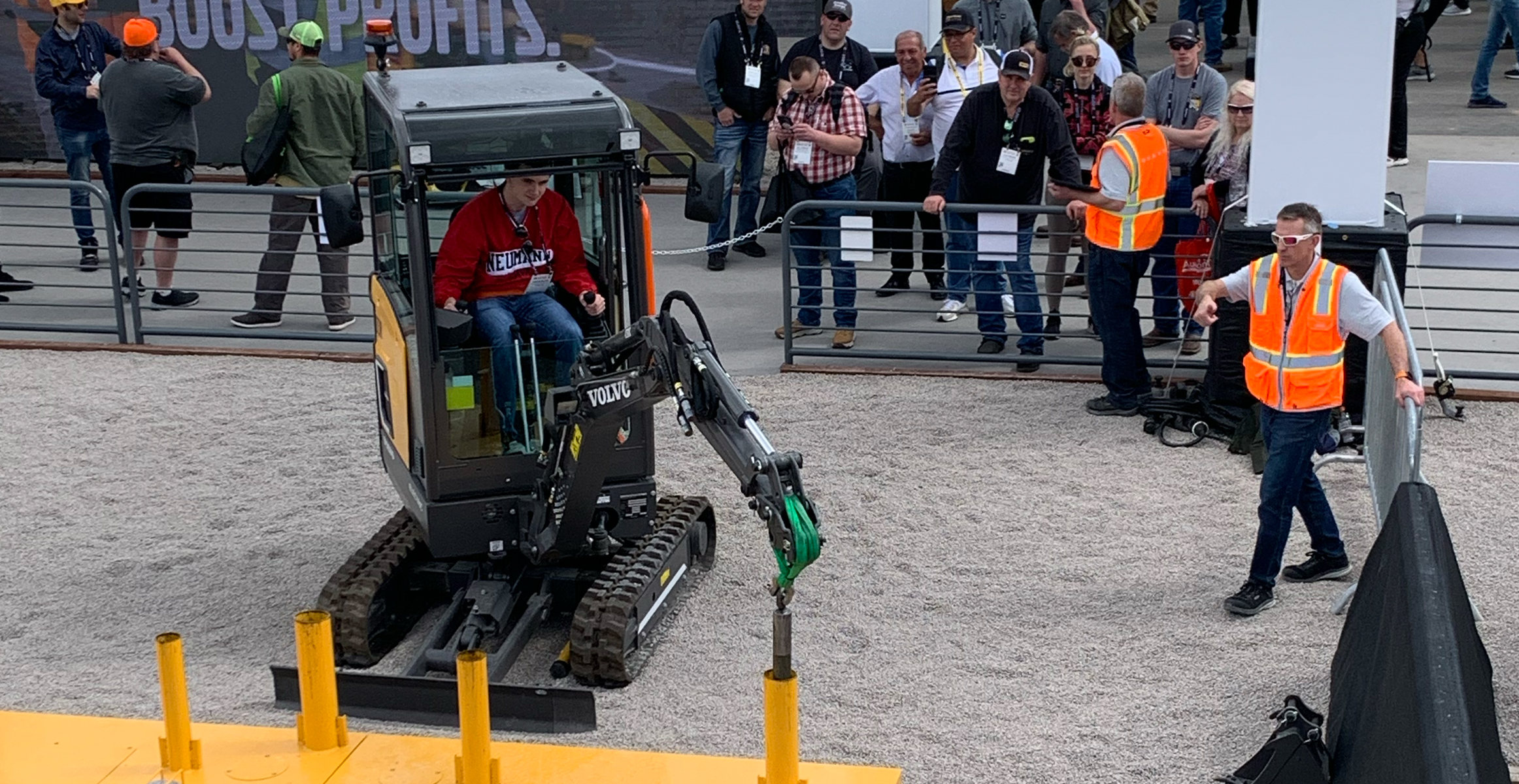 An overhead shot of an operator competition using Volvo electric equipment at CONEXPO 2023.