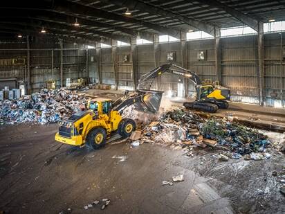 Volvo EC250E and L180H Waste Handler