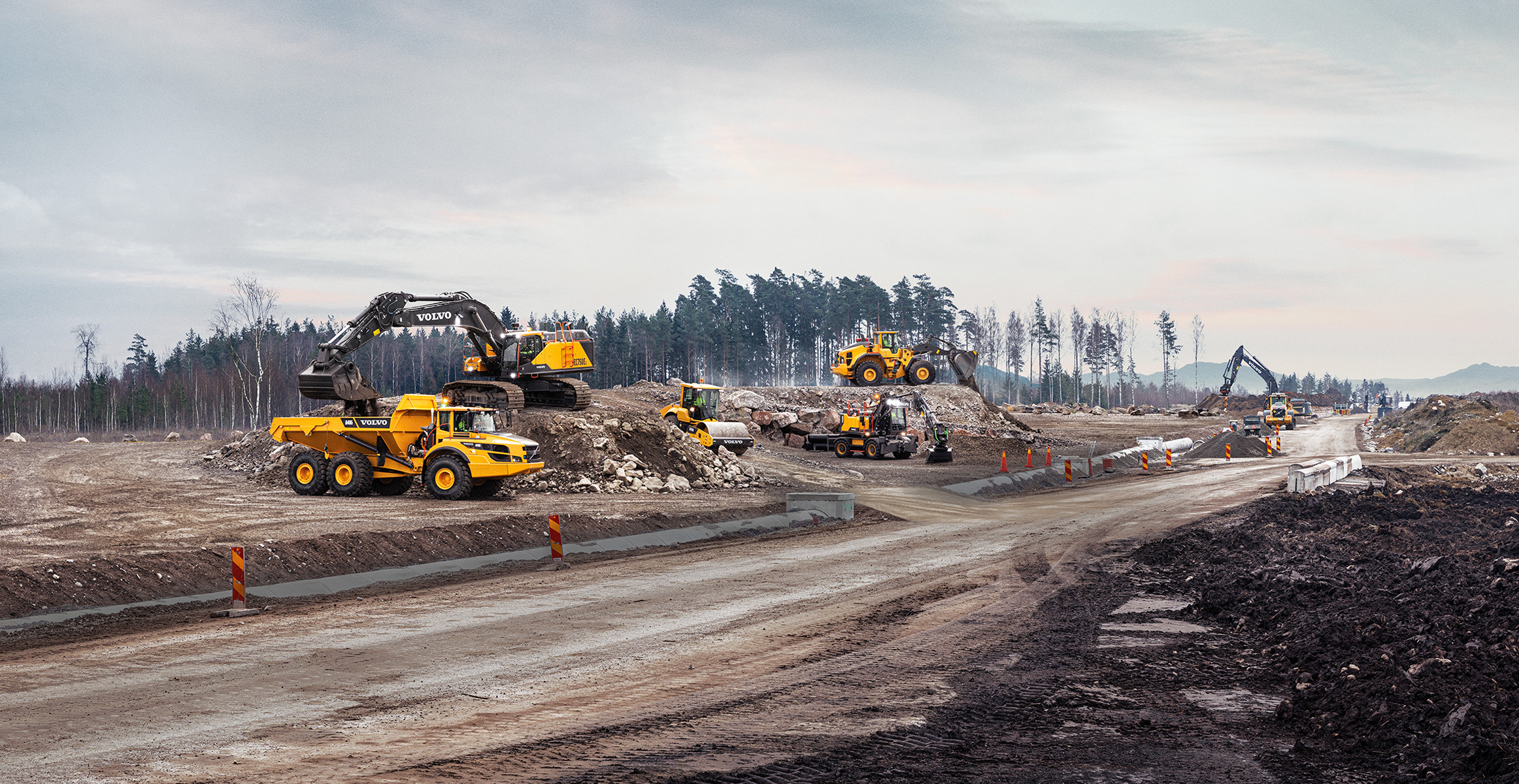 Volvo heavy equipment at work on a construction site.