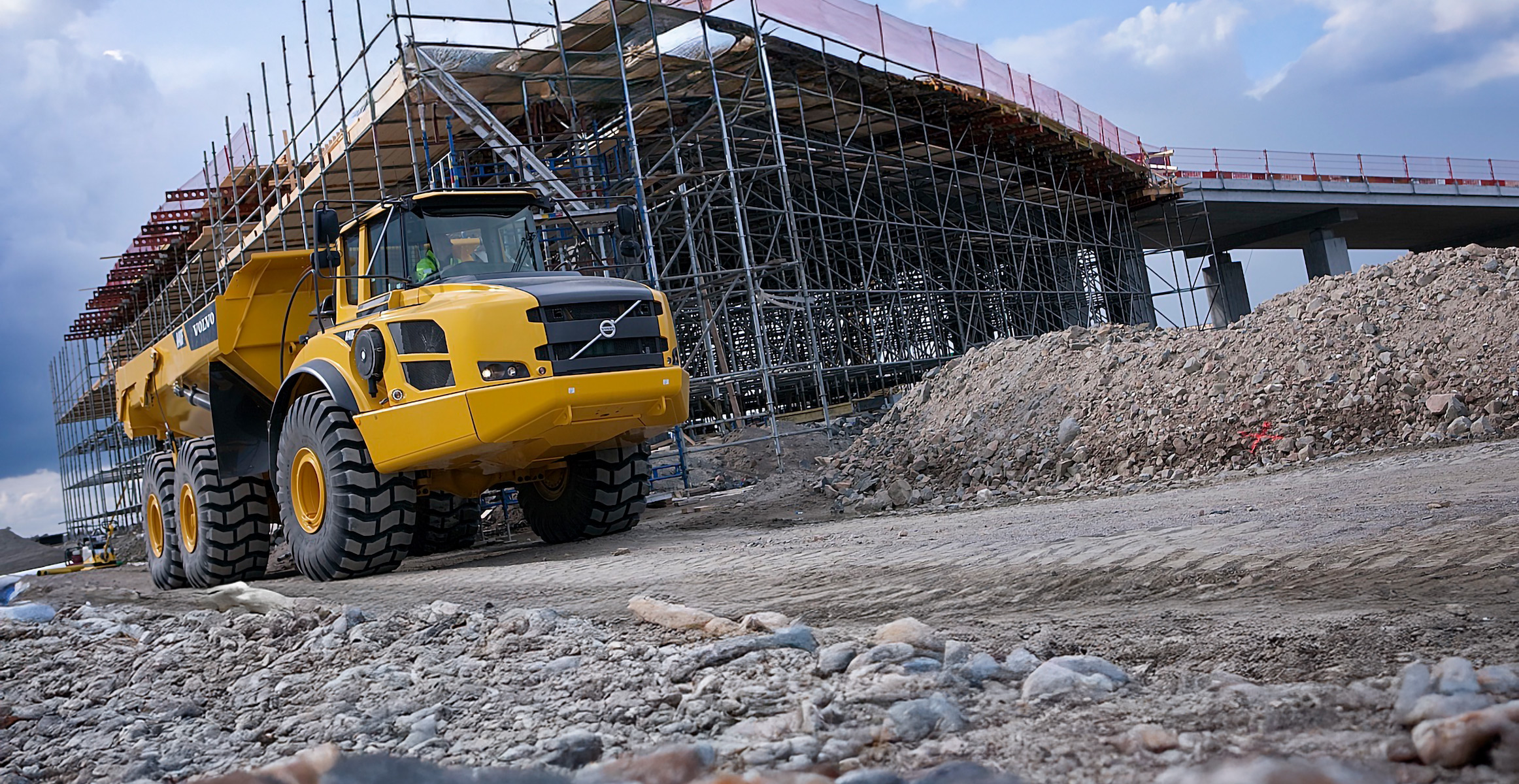 A Volvo articulated dump truck working in new construction. 