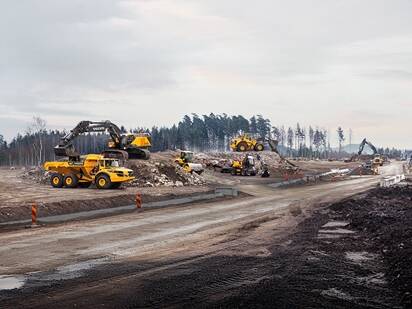 Volvo construction equipment working together on a construction jobsite.