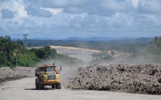 The A35E charges through the dusty site.