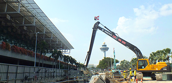 A Volvo excavator is used to maneuver steelwork on the development of the taxi underpass.