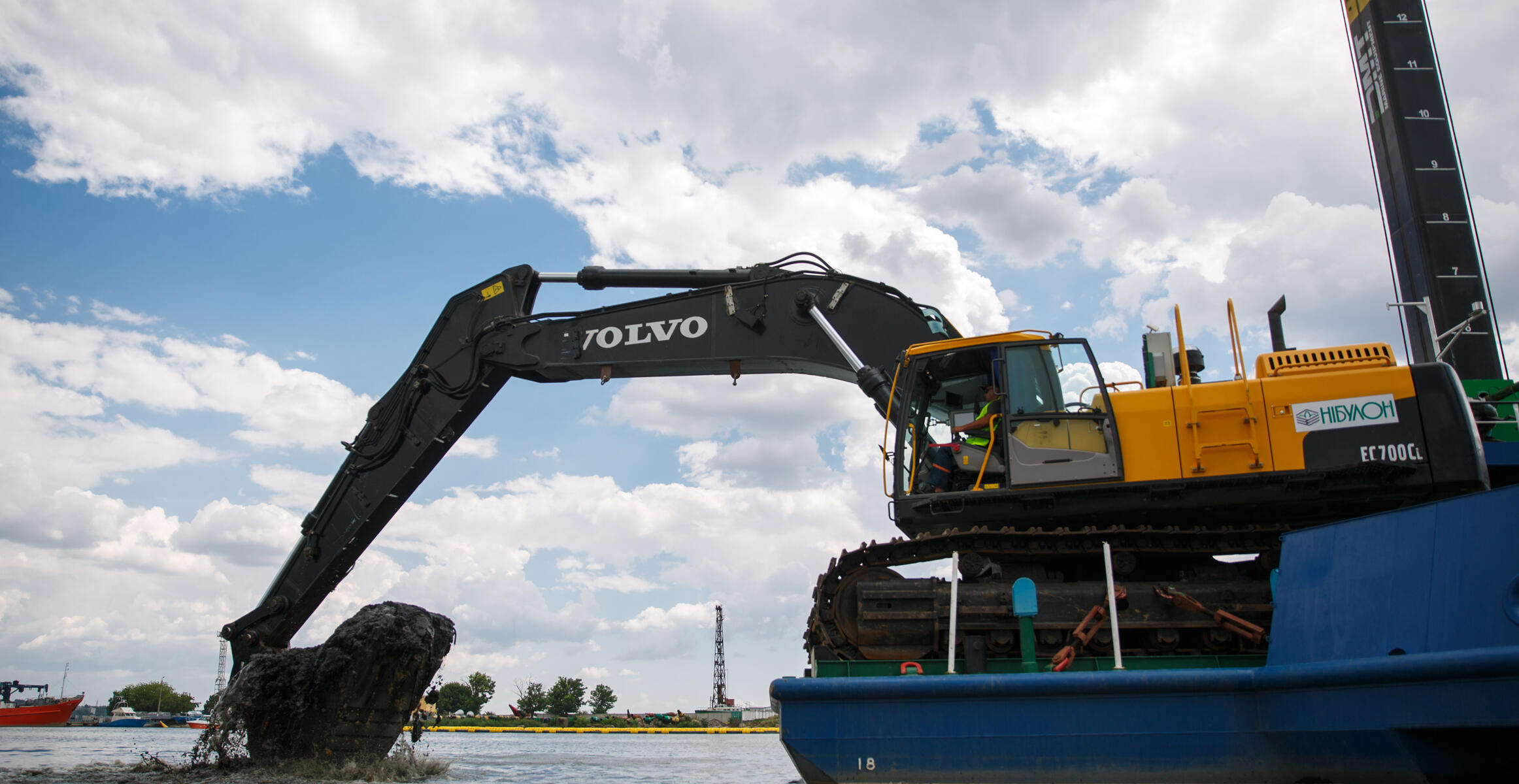 Volvo dredging excavator in action