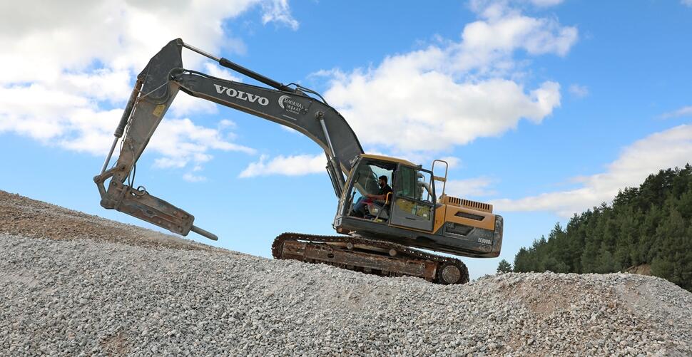 Volvo EC300D excavator fitted with a breaker.