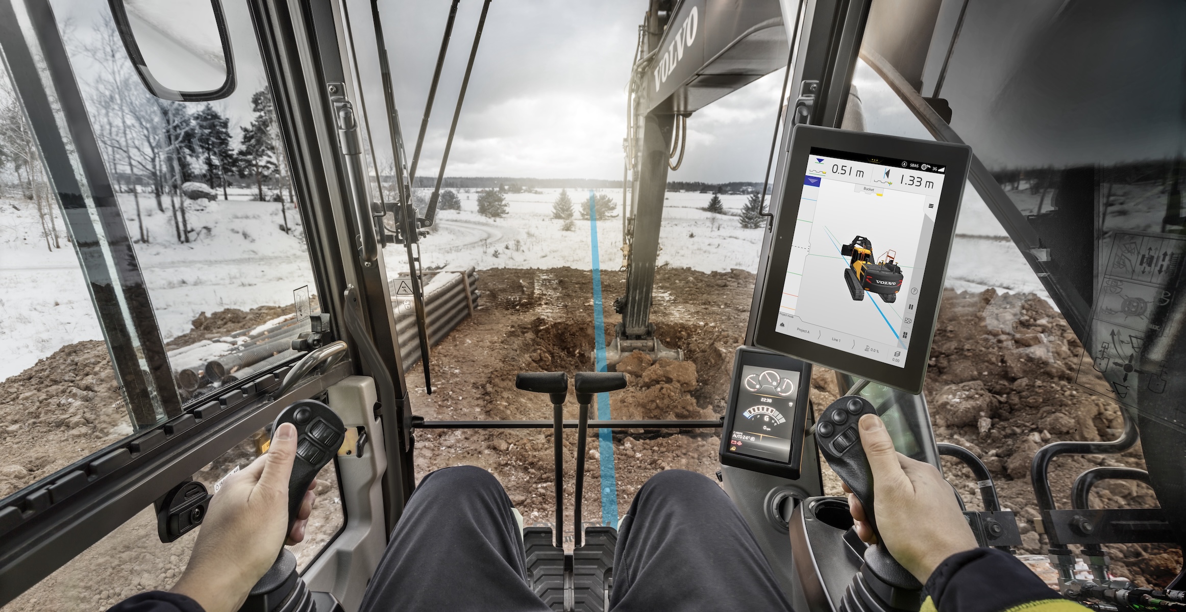 View from the cab of a Volvo excavator, with Dig Assist visible on the Volvo Co-Pilot display.