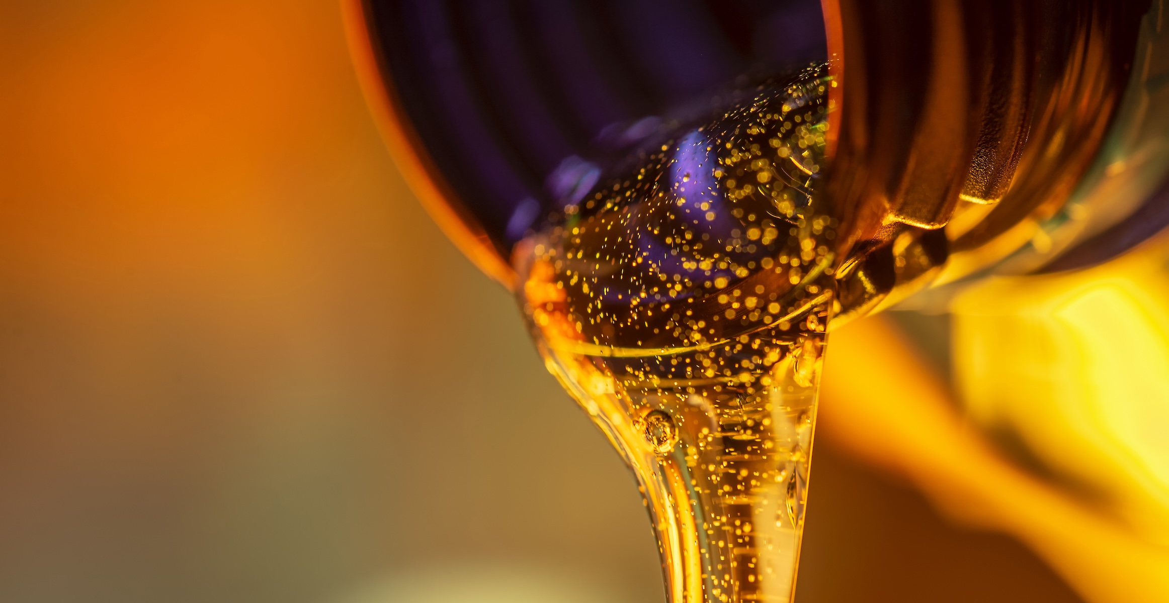 Close-up of Volvo oil being poured from its container.